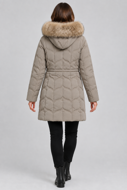 Back view of model wearing taupe quilted jacket with trimmed hood